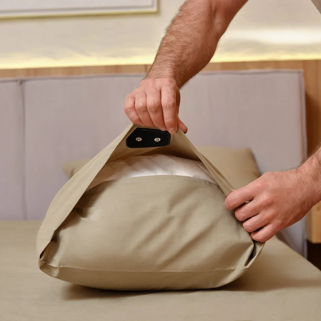 man-showing-earthing-harmony-pillowcase-connecting-snaps.jpg